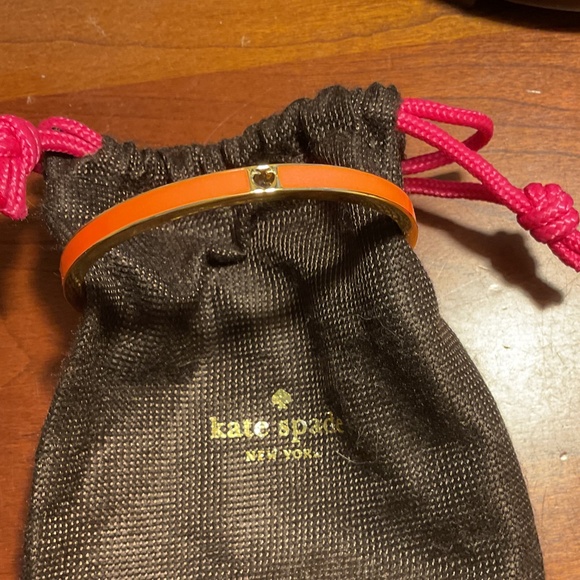 Vintage Kate Spade New York Orange Bangle Bracelet with the cut out “Spade”. - Picture 4 of 4